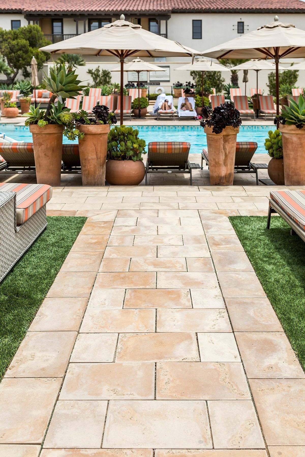 Paver walkway to the pool
