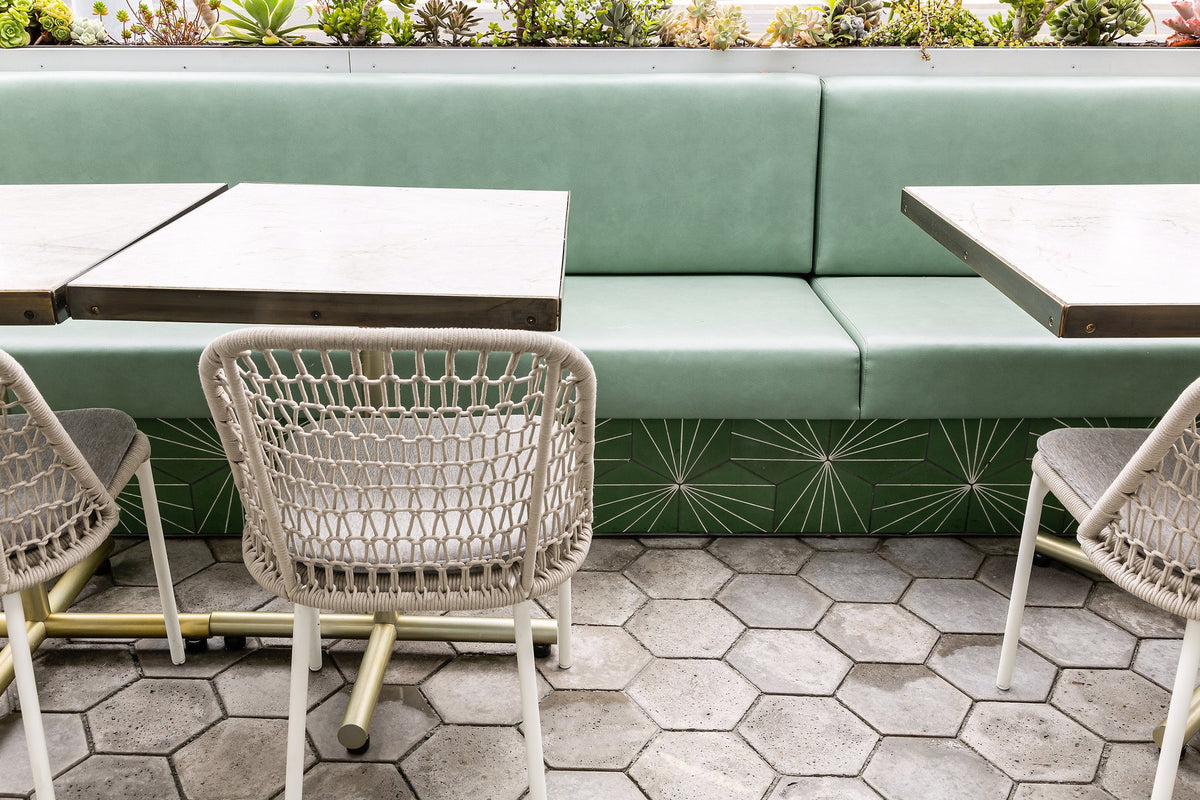 Banquette seating over hexagon floor