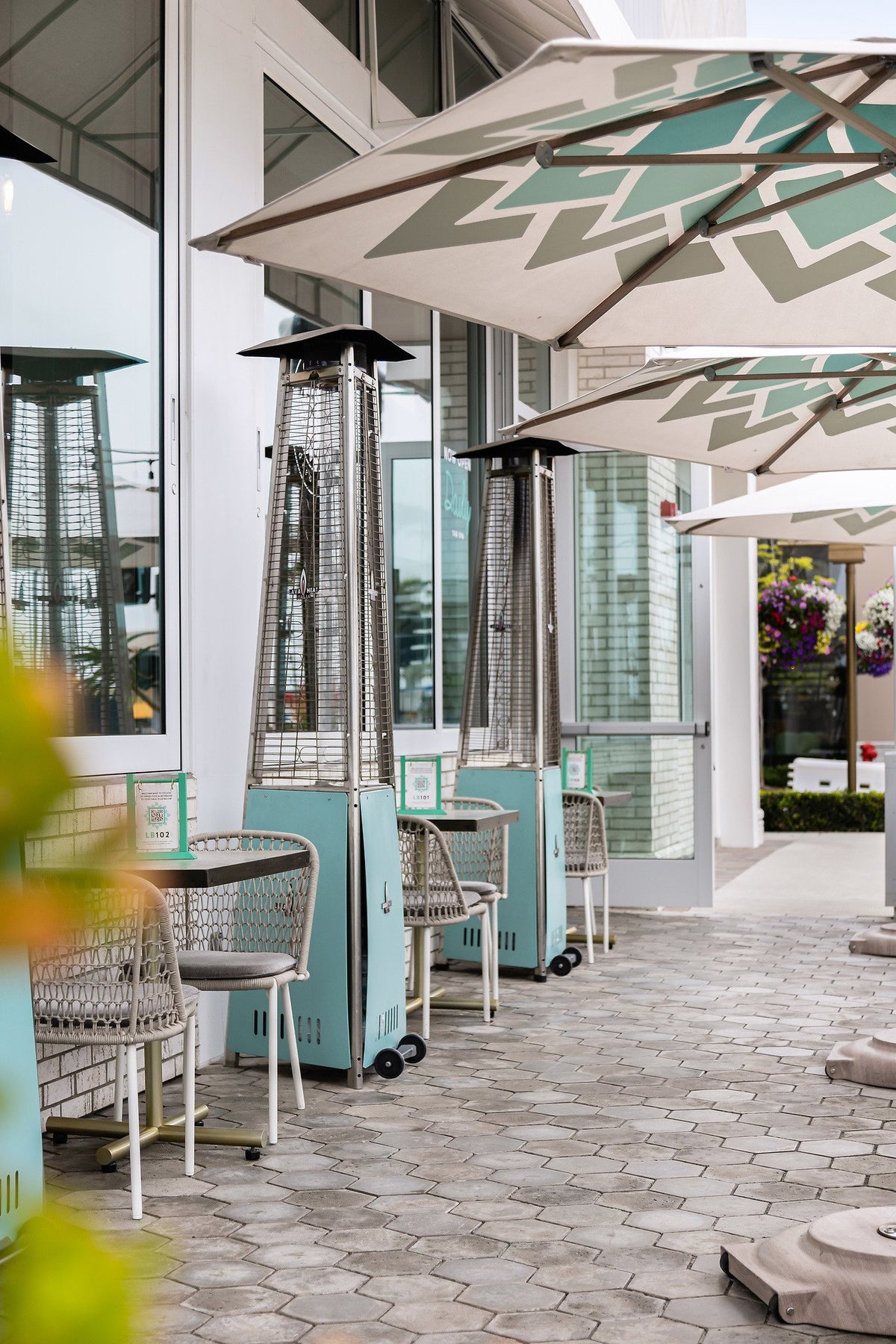 Patio heaters along the storefront