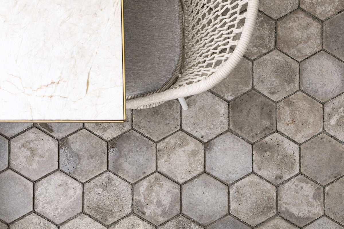 Hex pavers under a dining chair