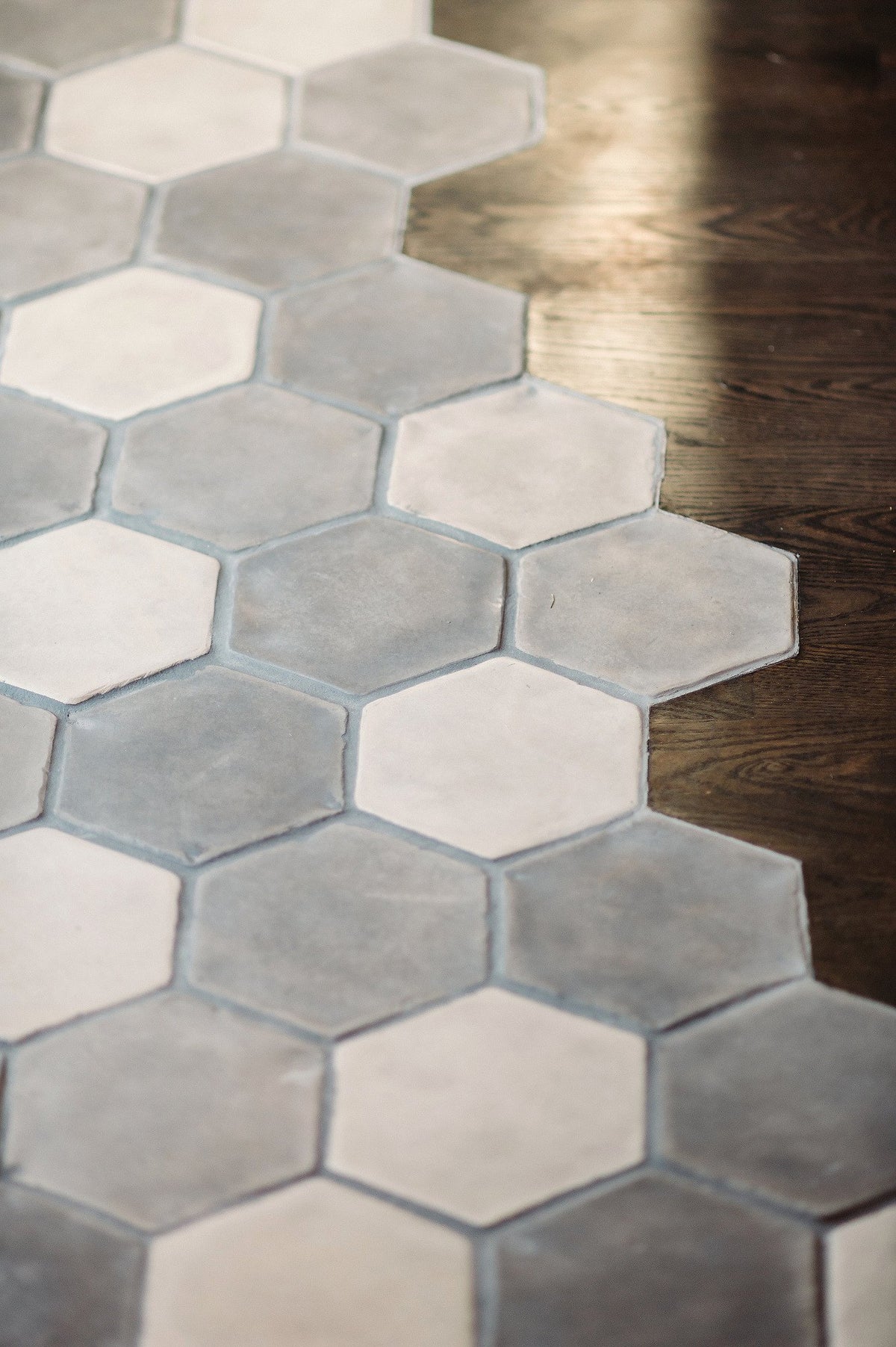 Staggered edge into the oak floor