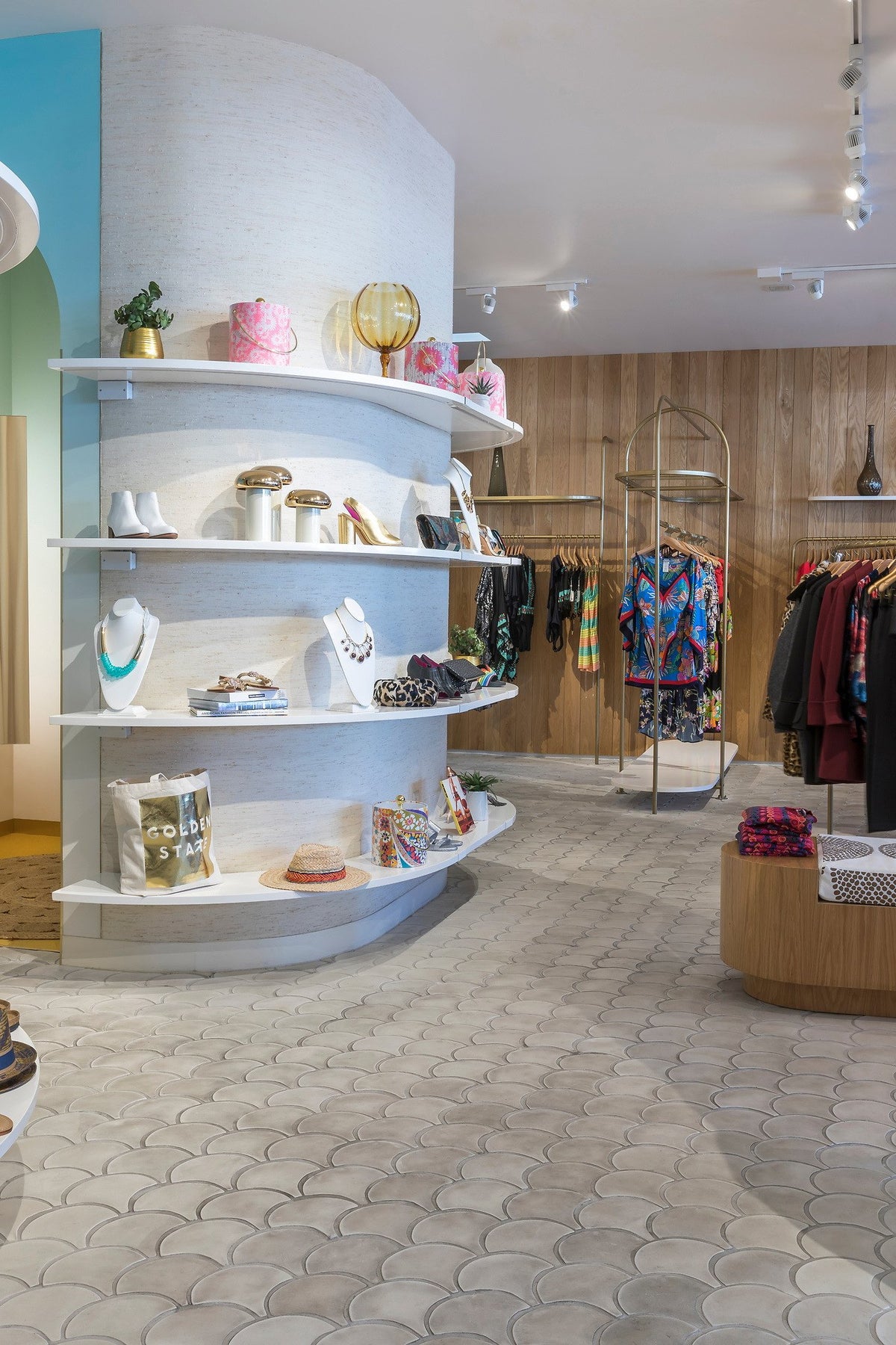Curved shelving above the tile