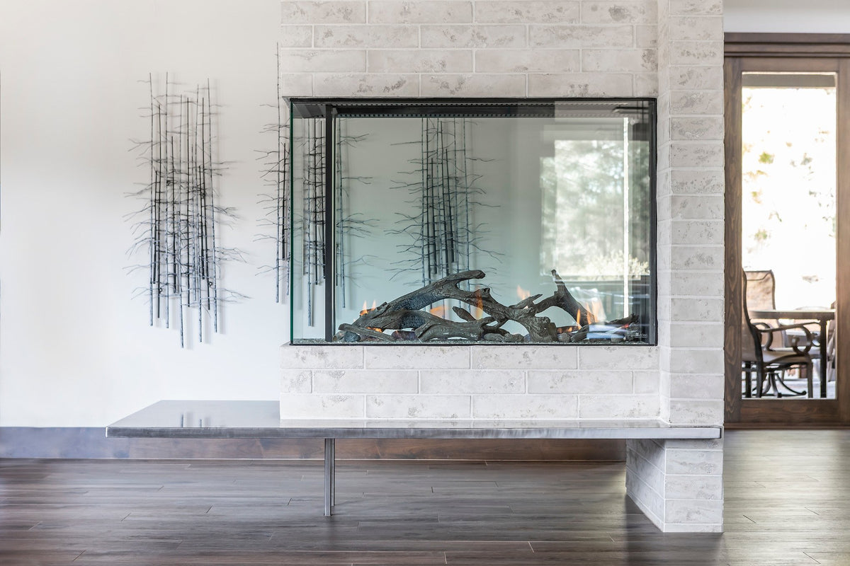 See-through fireplace wrapped in brick