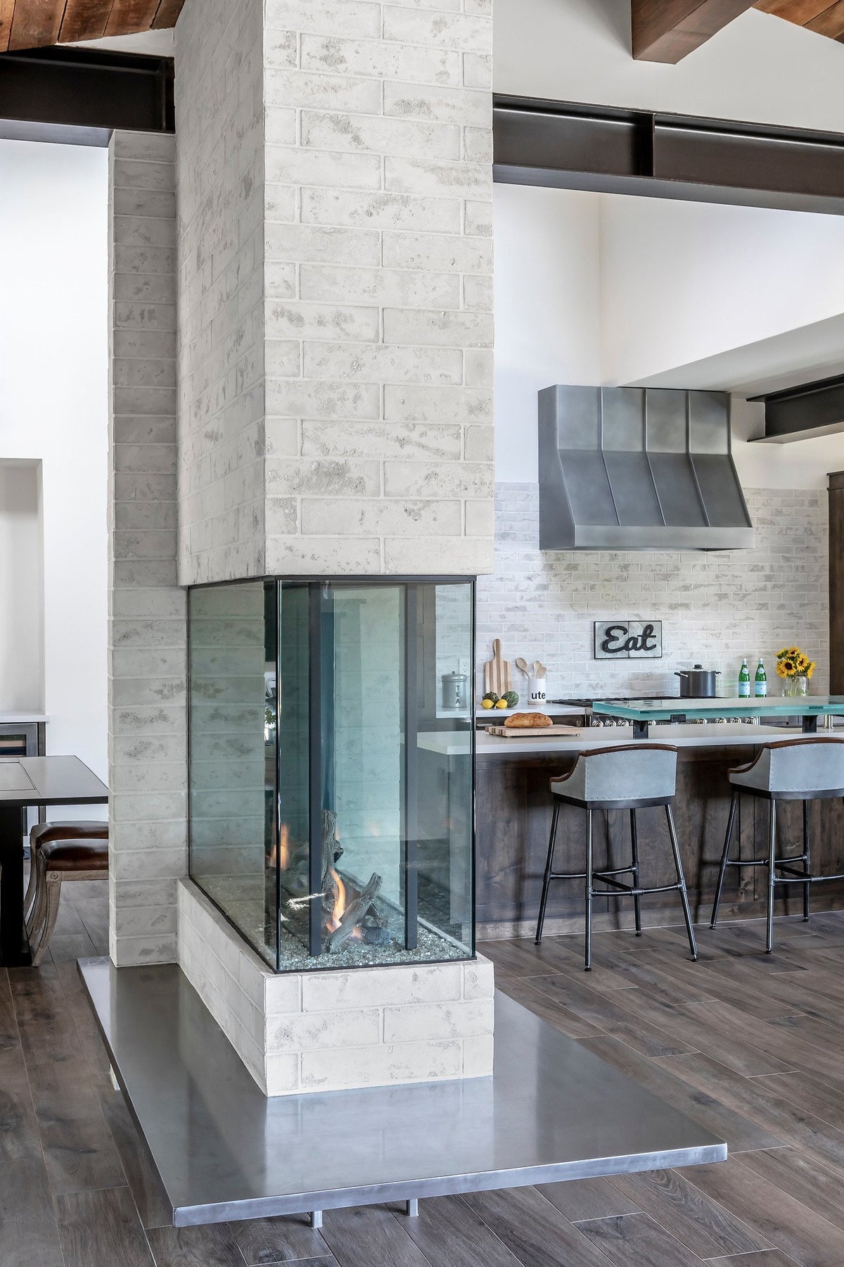 Brick fireplace column toward the kitchen