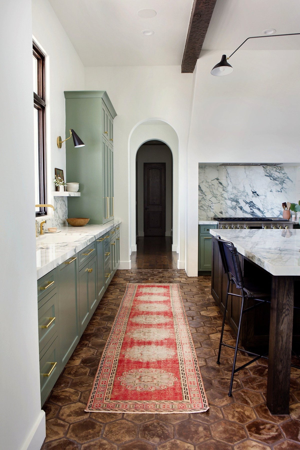 Galley run toward the arched door