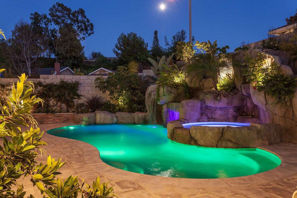 Lagoon pool and grotto at night