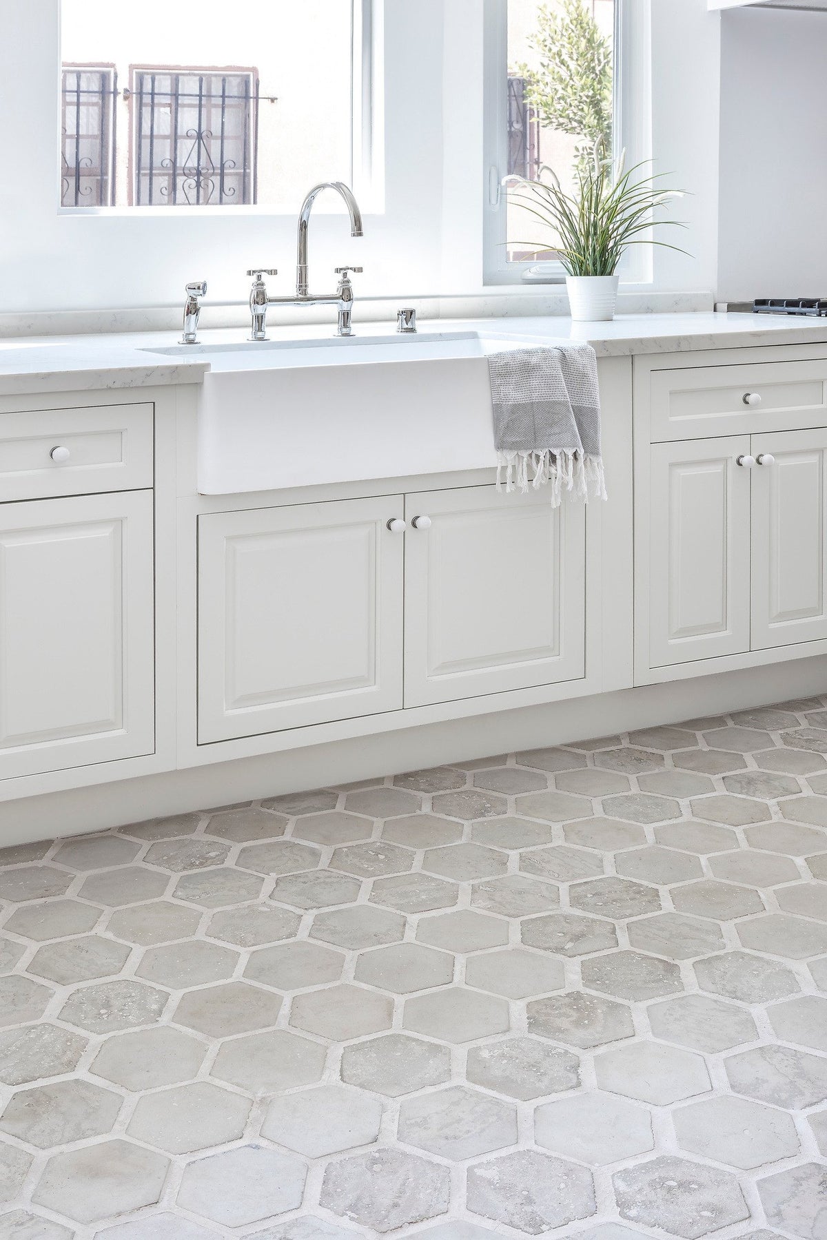 Farmhouse sink over Early Gray hexagons