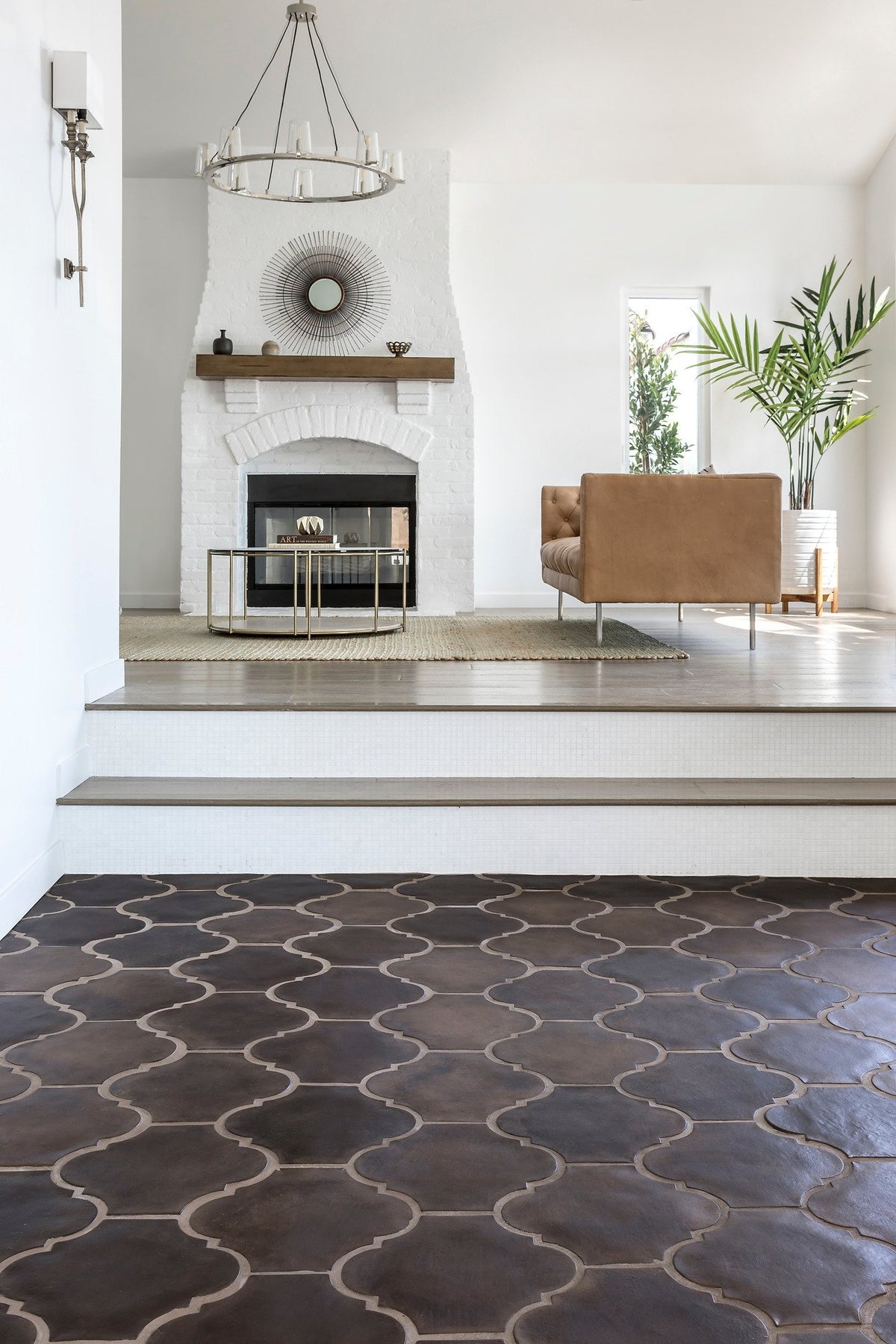 Raised fireplace above the tile floor