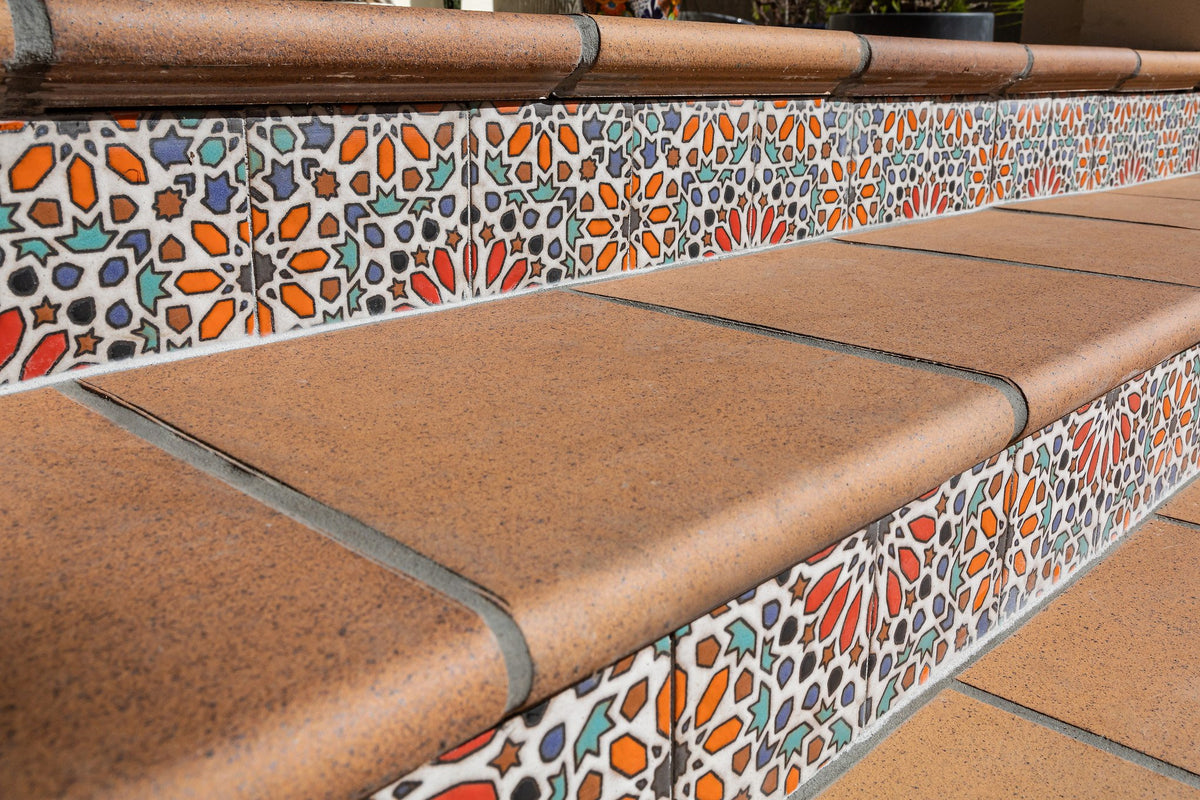 Deco risers below terracotta treads