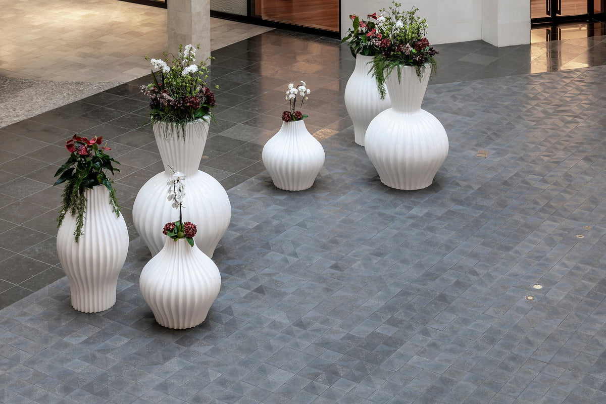 White planters on Charcoal concrete