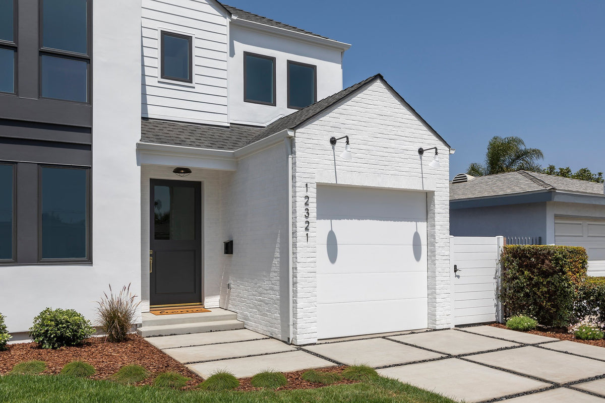 Side view of the brick garage wing