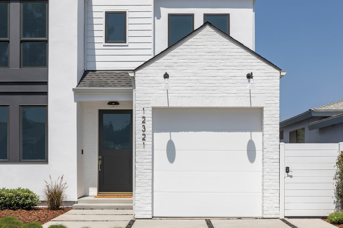 Entry and garage in painted brick