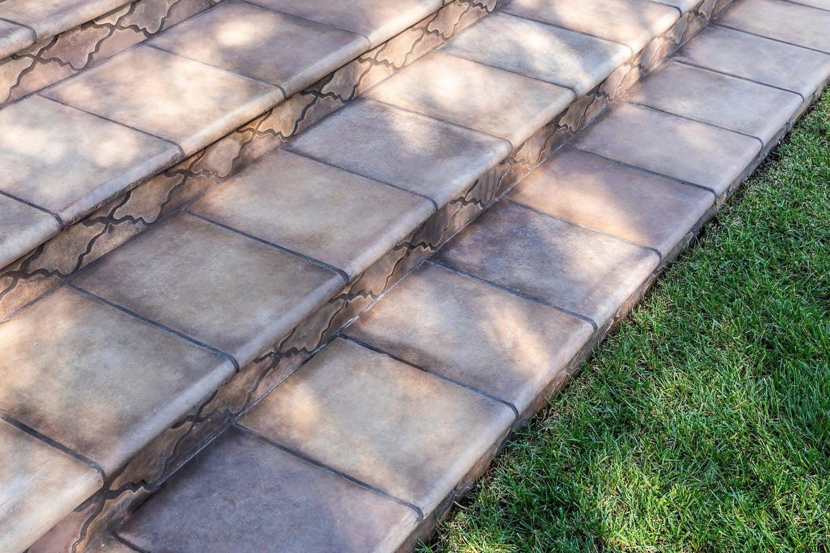 Patio steps down to the lawn