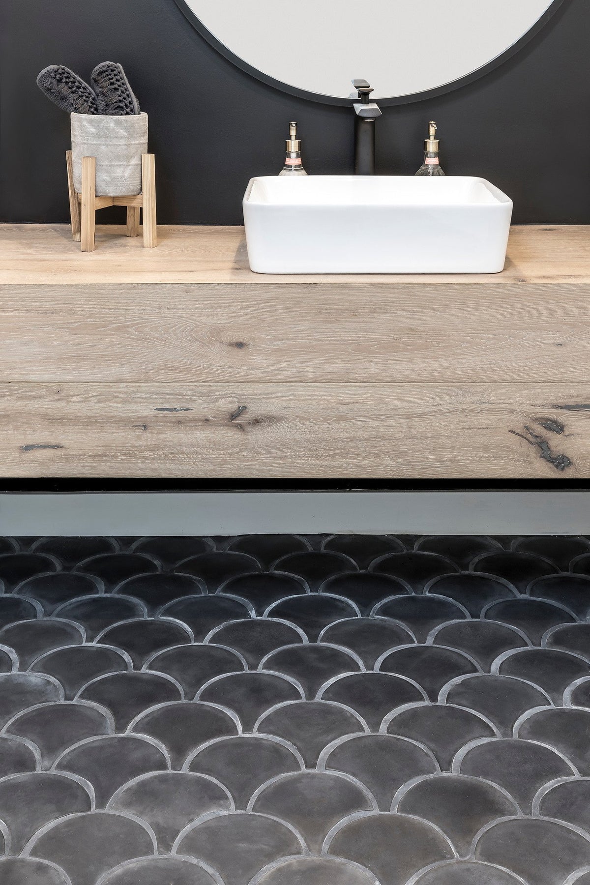 Floating vanity over Conche tile
