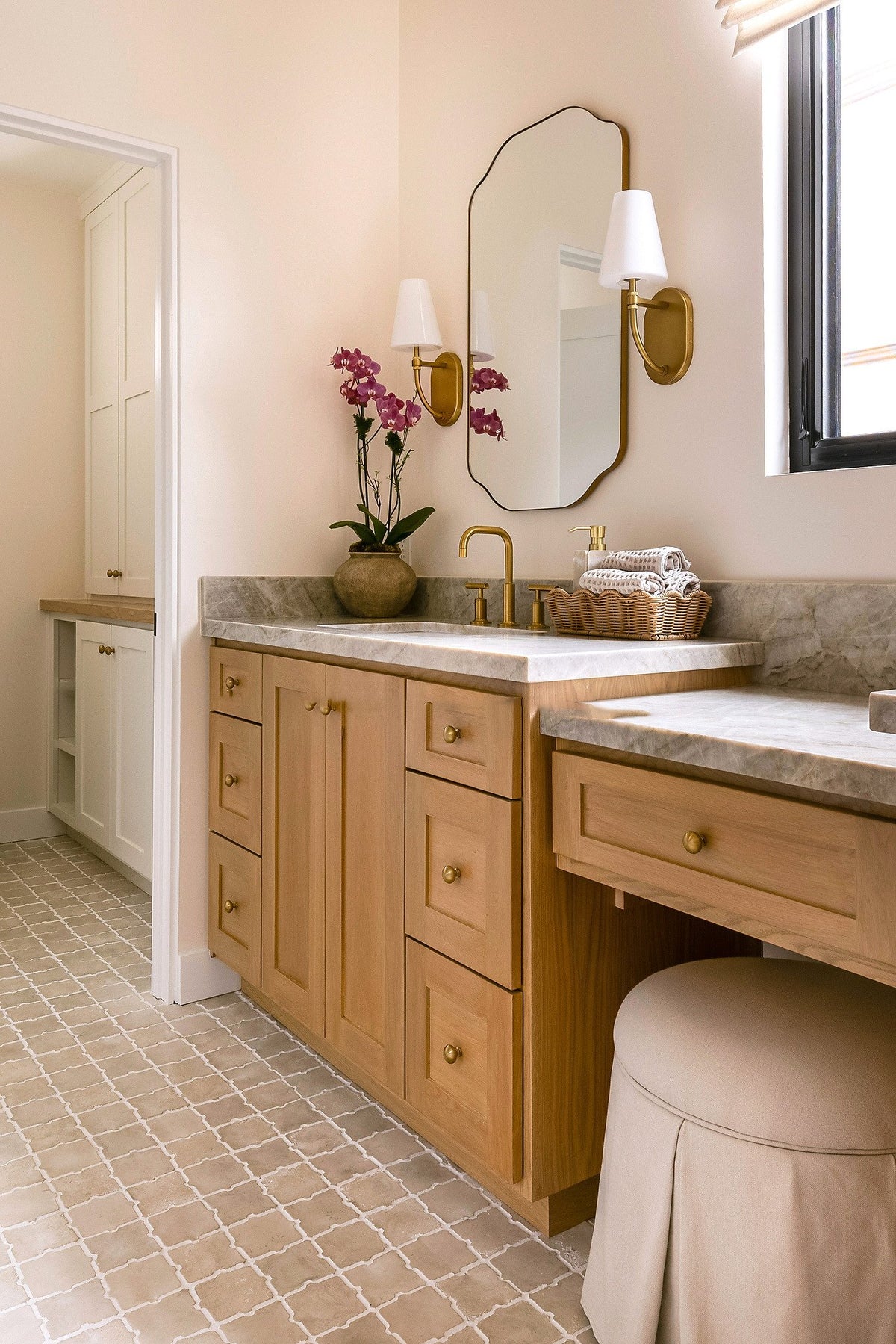 Makeup vanity and tiled floor
